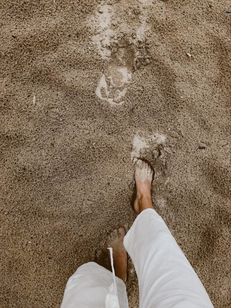 walking in sand barefoot