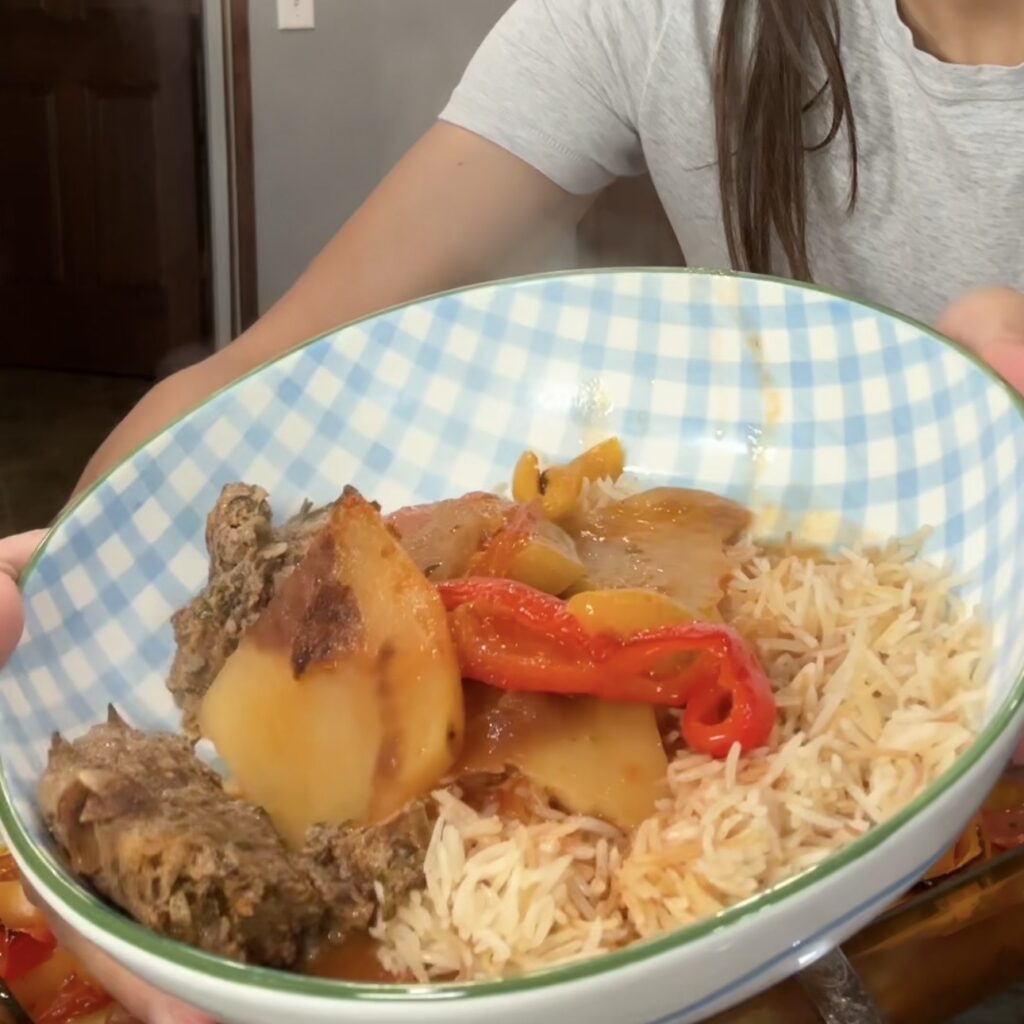 Kafta bil sanieh with Lebanese baked kafta, potatoes, peppers, and vermicelli rice